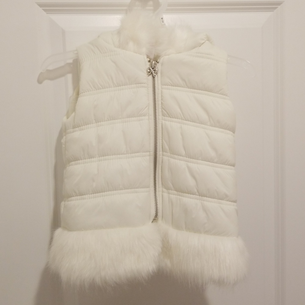 White puffer vest